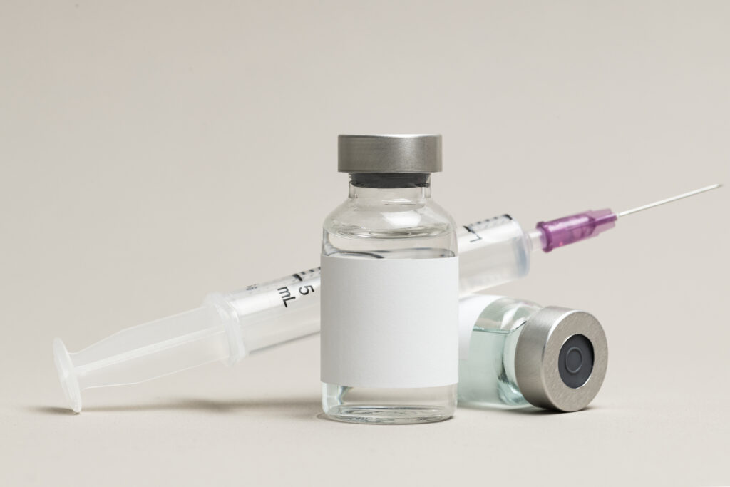 A close-up, artistic shot of a small vial or syringe, perhaps with a soft glow, to represent the Rejuran product. It should look clean and professional.